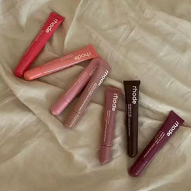 Rhode gloss lip tint texture drop showing glossy hydration and smooth finish