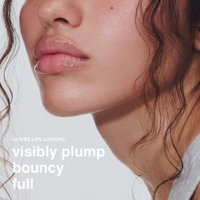 Rhode lip boost open texture close-up highlighting smooth cream and moisture