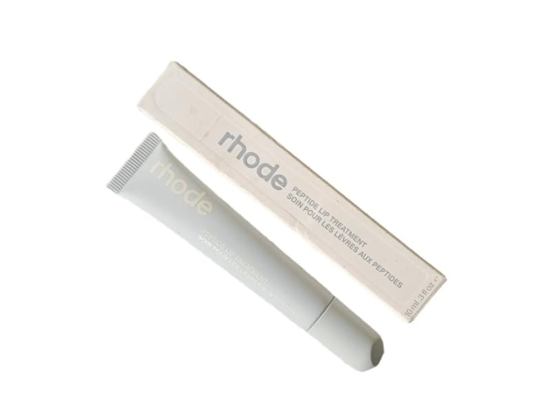 Rhode Salted Caramel lip treatment tube close-up showing glossy hydration benefit