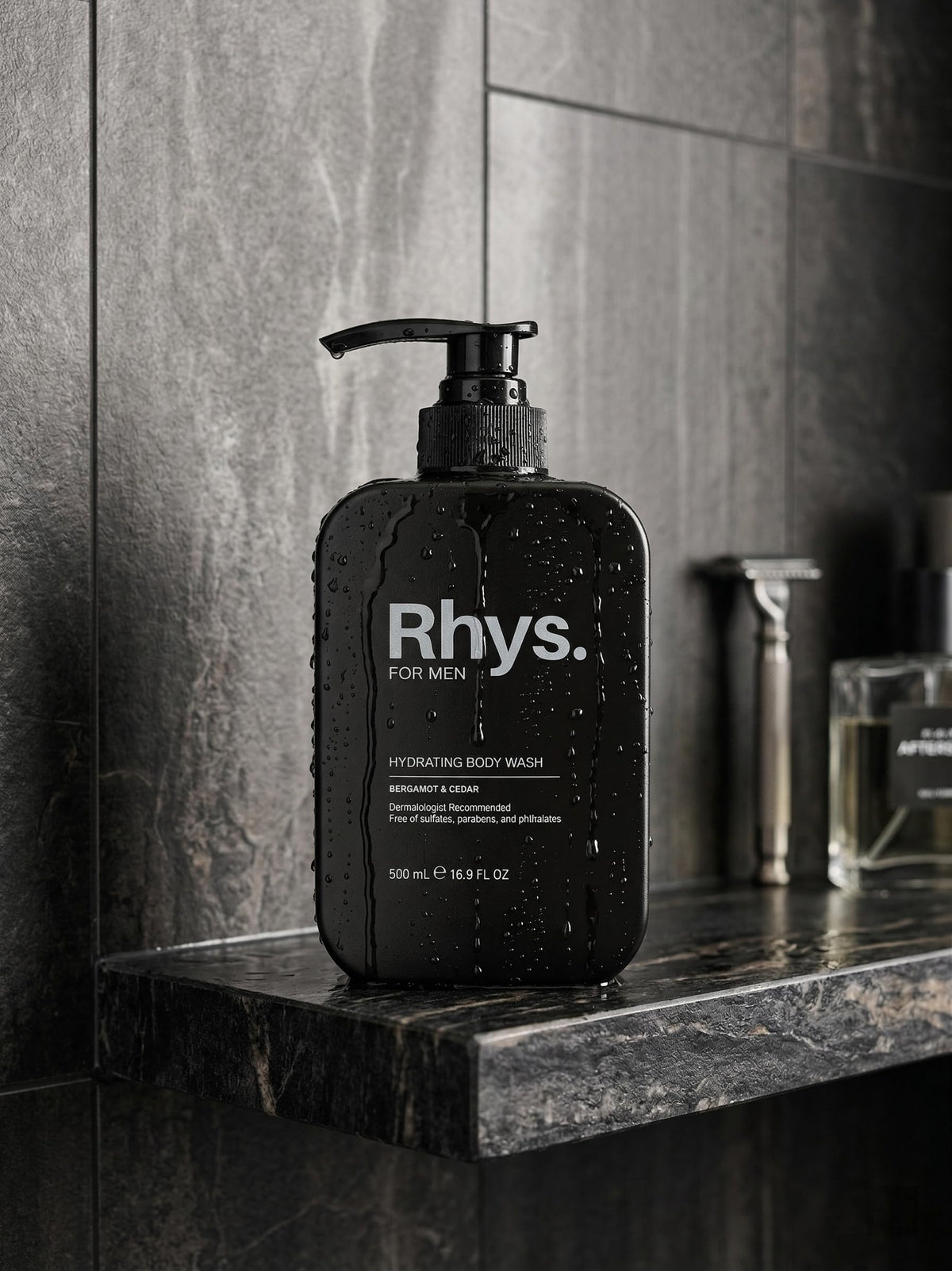 Rhys 16.9 fl oz bottle beside common items for scale, clarifies size and travel convenience