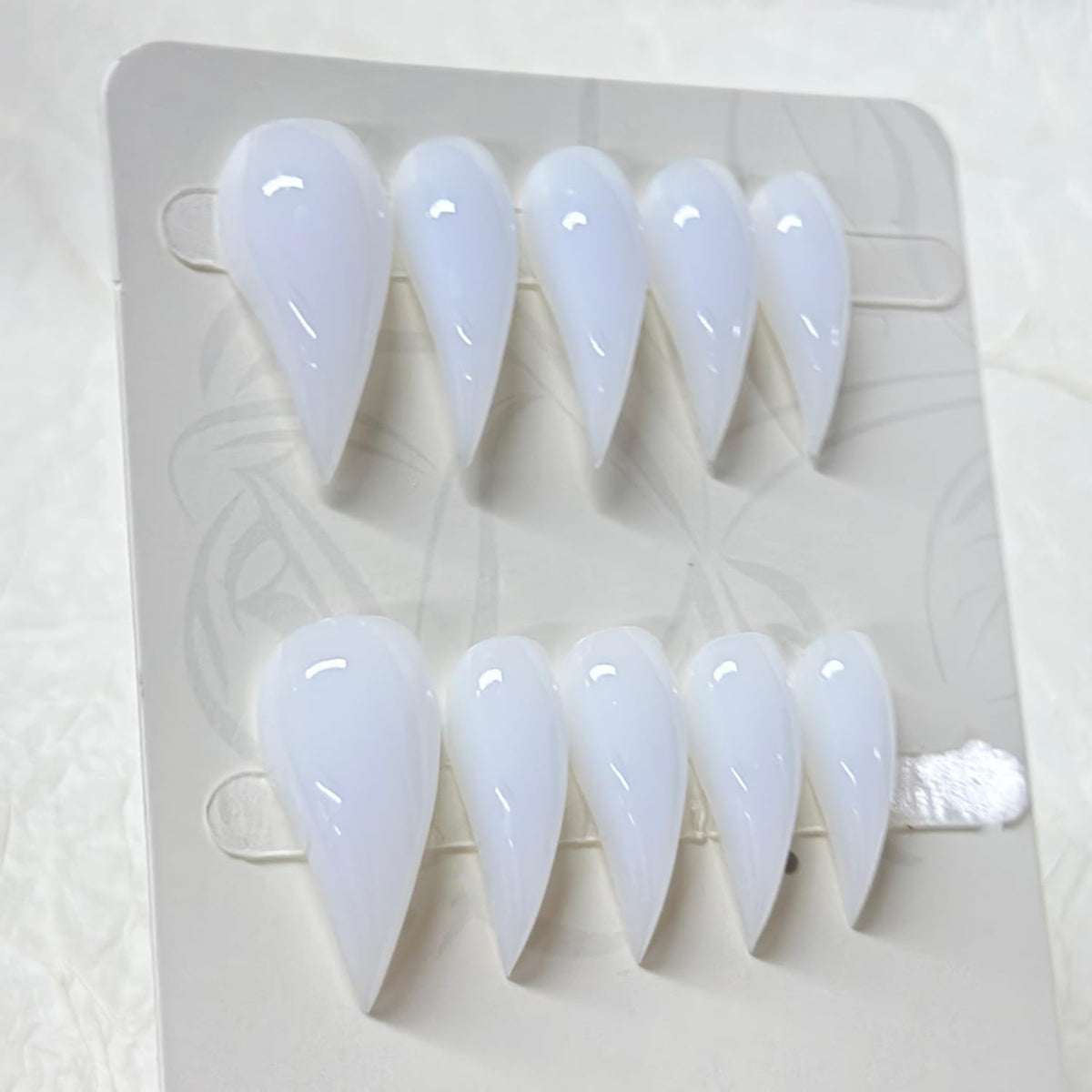 RIICFDD application with adhesive tabs showing quick salon-free setup
