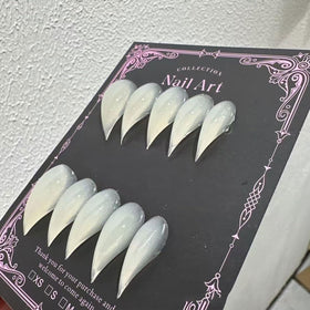 RIICFDD front packaging showing 10-piece dragon claw nails and quick benefit