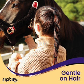 Rip Tie in-hair ponytail demonstrating secure hold for long hair