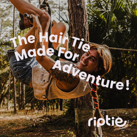 Rip Tie in a runner's ponytail outdoors illustrating secure all-day hold