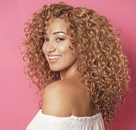 Rizos Curls bottle styled with hair products conveying routine integration benefit