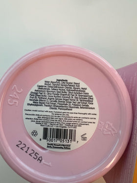 Rizos Curls label closeup showing vitamin C and repair claims