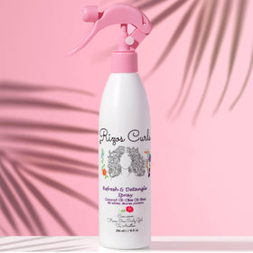 Rizos Curls texture on fingers highlighting nourishment and non-greasy finish