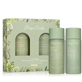 Rizos Curls front packaging showing travel biotin wash bundle and clear labeling for easy travel