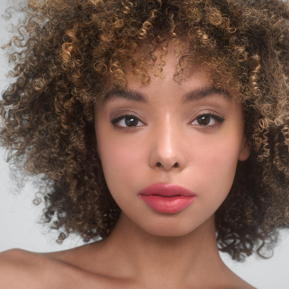 RMS Beauty application on lips showing glossy finish and hydrating look