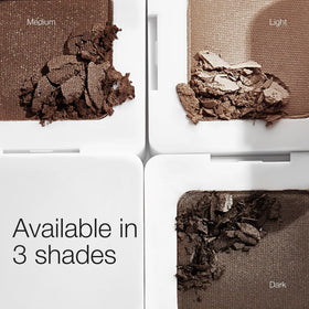 RMS Beauty size comparison in hand illustrating compact travel-friendly design
