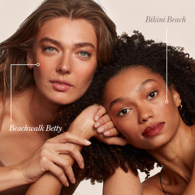 RMS Beauty bronzer picked up on brush illustrating buildable application benefit