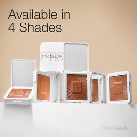 RMS Beauty lifestyle model outdoors showing hydrated sun-kissed complexion