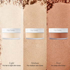 RMS Beauty powder held in hand to show small 0.21 oz size and travel-friendly benefit