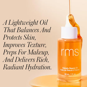 RMS Beauty dropper releasing oil to show silky lightweight texture and easy application