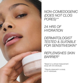 RMS Beauty Kakadu Luxe Cream held in hand to show jar size and scale