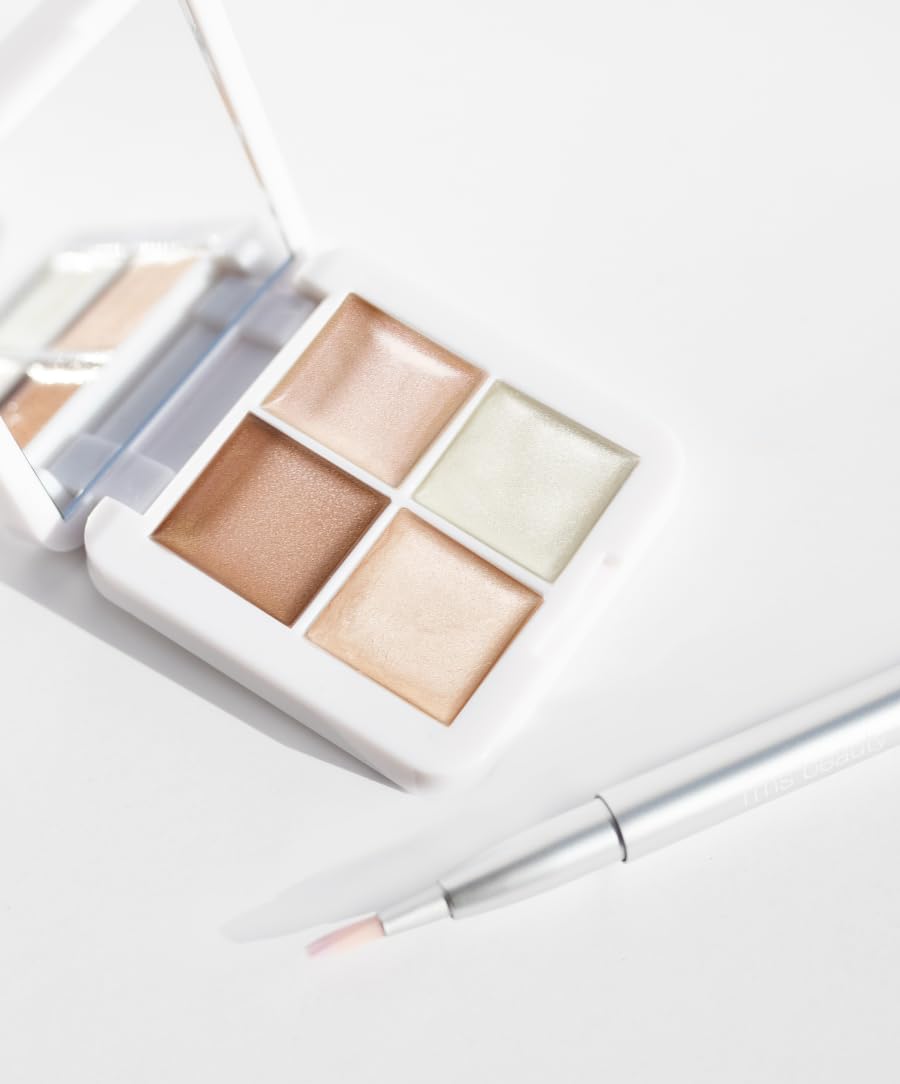 RMS Beauty pot next to coin showing compact size and easy portability