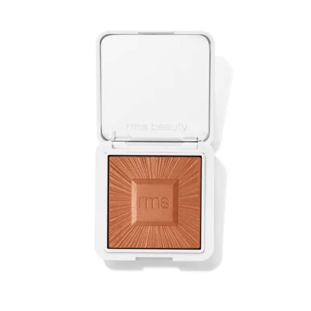 RMS Beauty compact front view showing refillable design and polished finish