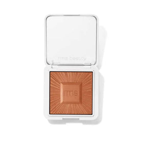 RMS Beauty compact front view showing refillable design and polished finish