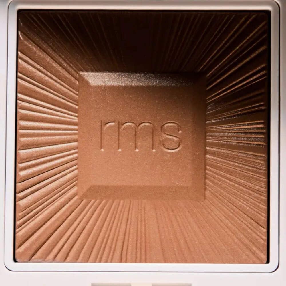 RMS Beauty side profile of compact emphasizing sleek, portable packaging