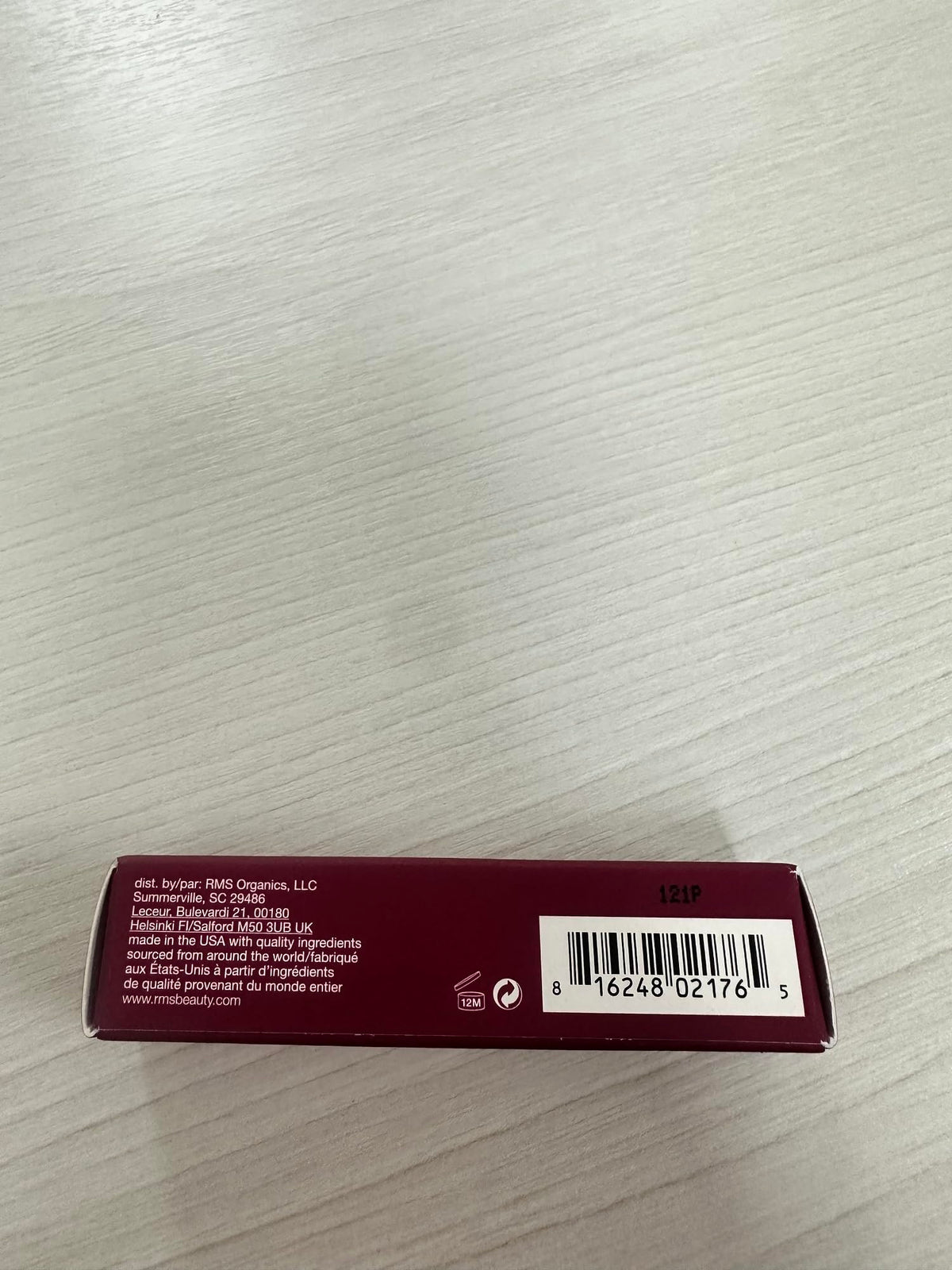 RMS Beauty balm inside a purse showing travel-ready convenience benefit