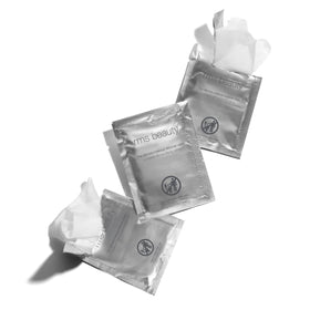 RMS Beauty wipe removing eye makeup gently, protecting delicate eye area