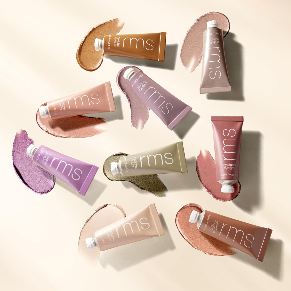 RMS Beauty product inside a makeup bag lifestyle scene showing everyday wearable shimmer