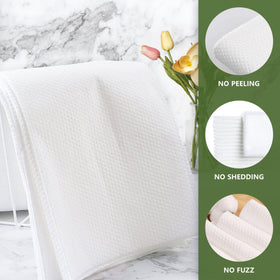 rngwaper towel beside ruler showing 16x31.5 size advantage