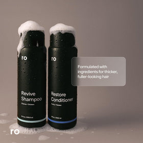 Ro close-up of Revive shampoo pump delivering controlled cleansing for less waste