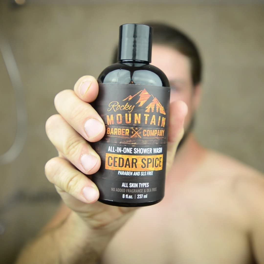 Rocky Mountain Barber Company bottle on shower shelf showing compact, travel-friendly size