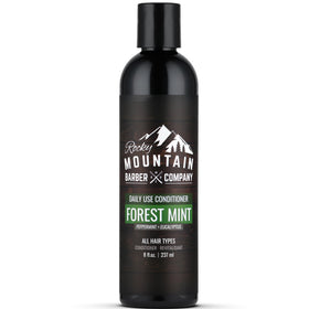 Rocky Mountain Barber Company front bottle showing product and brand benefits