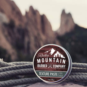 Rocky Mountain Barber Company small-batch stamp on label suggesting fresh handcrafted quality