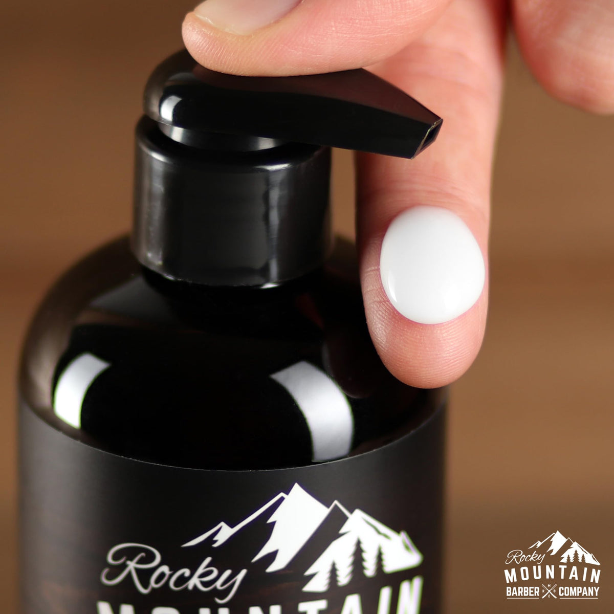 Rocky Mountain Barber Company in-use styling demo applying cream for natural hold
