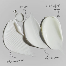 RODAN + FIELDS applying cleanser to cheek demonstrates gentle exfoliation