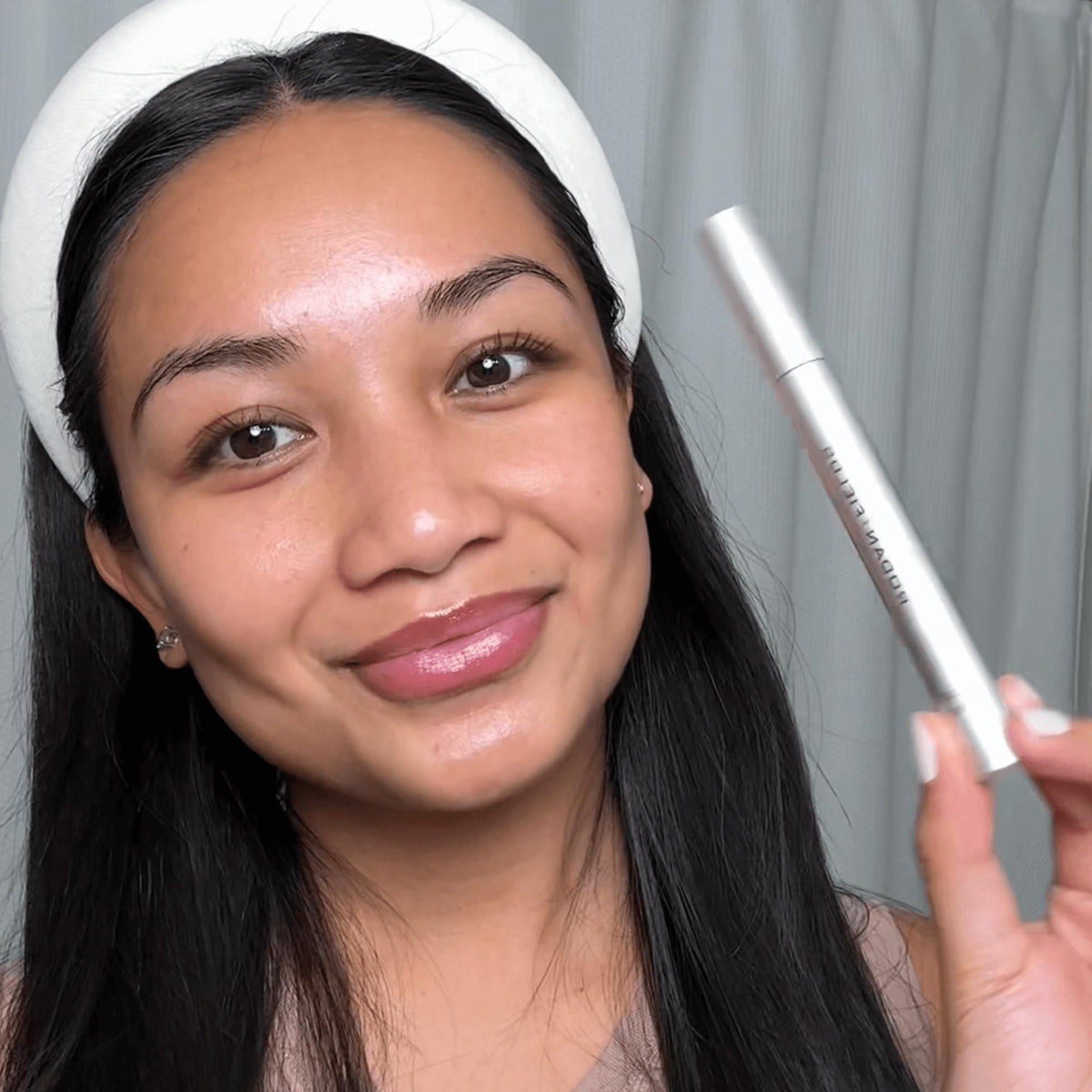 RODAN + FIELDS applied along eyebrow for targeted definition, supports fuller-looking brows
