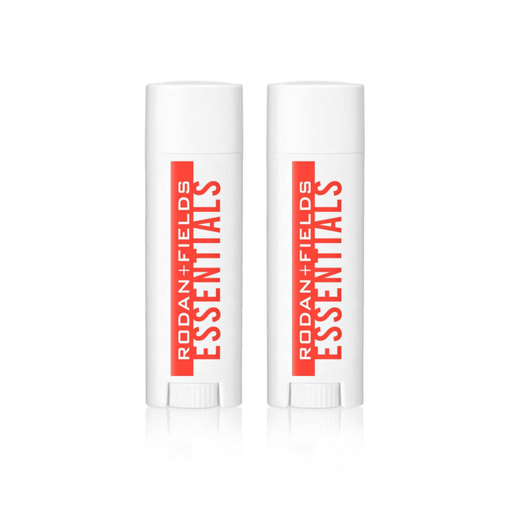 RODAN + FIELDS front packaging of two SPF 25 lip balm sticks showing travel-ready protection
