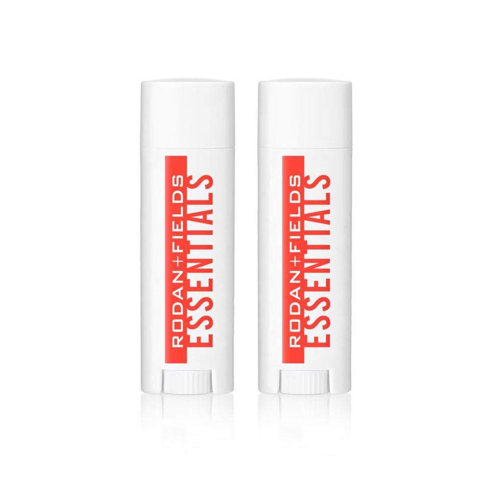 RODAN + FIELDS front packaging of two SPF 25 lip balm sticks showing travel-ready protection