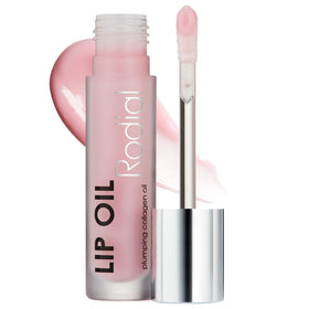 Rodial lip oil front packaging showing glossy soft pink tint and benefits