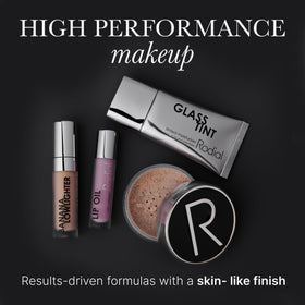 Rodial lip oil ingredients botanical display featuring cherry and macadamia for antioxidant nourishment