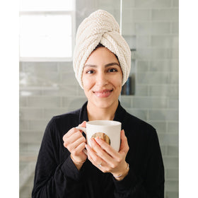 ROLSHOL model wearing towel wrap showing secure, hands-free drying