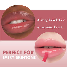 rom&nd on-model smiling to show natural, buildable peach tint benefit