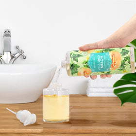 ROMIIE ZOI being poured into kitchen dispenser showing convenience benefit