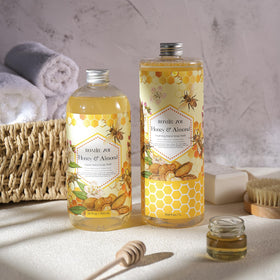 ROMIIE ZOI bottle next to a coffee cup showing 1 L scale and economical benefit