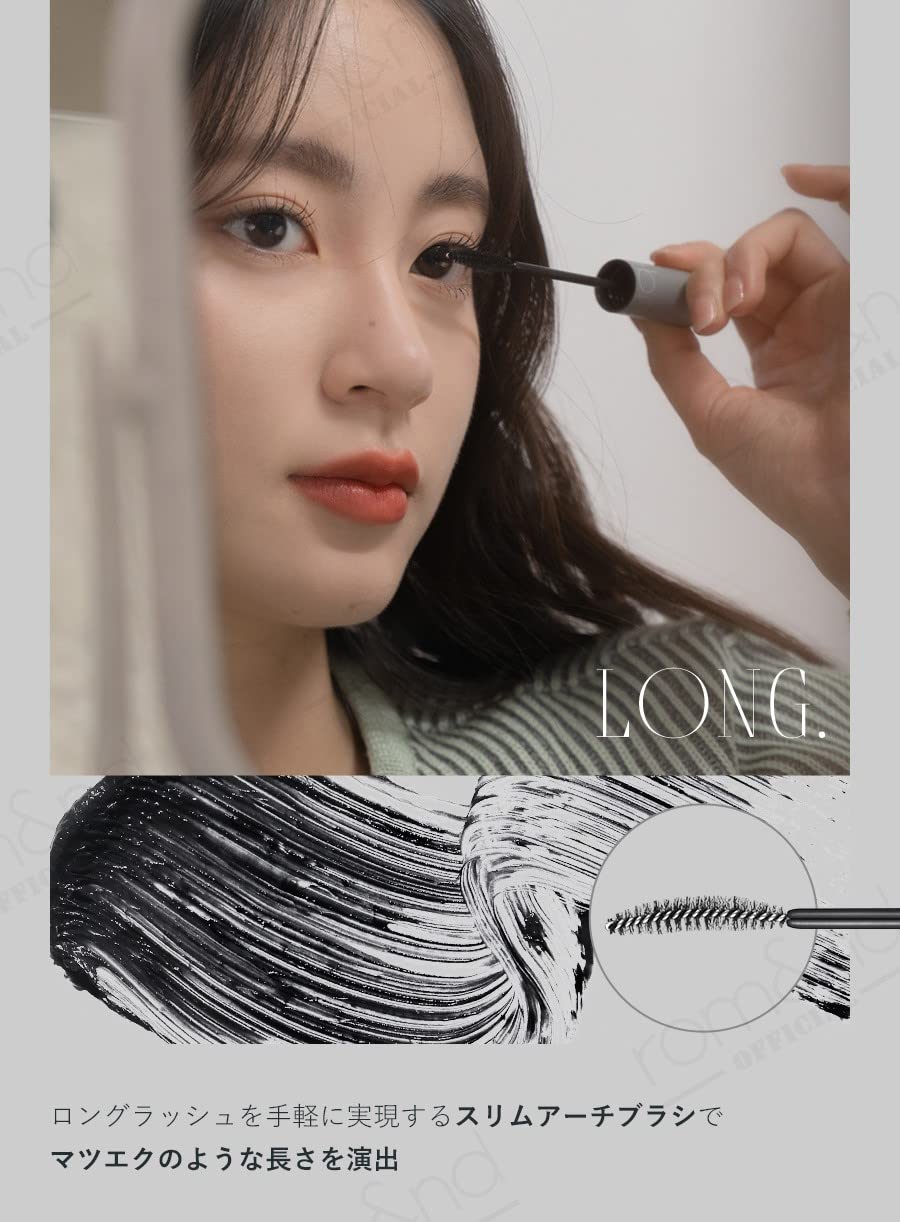 rom&nd mascara held in hand to show compact size and easy handling