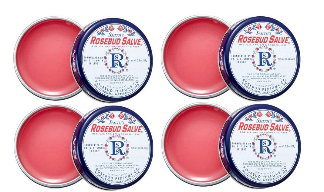 Rosebud Perfume front tin showing packaging and compact design for travel