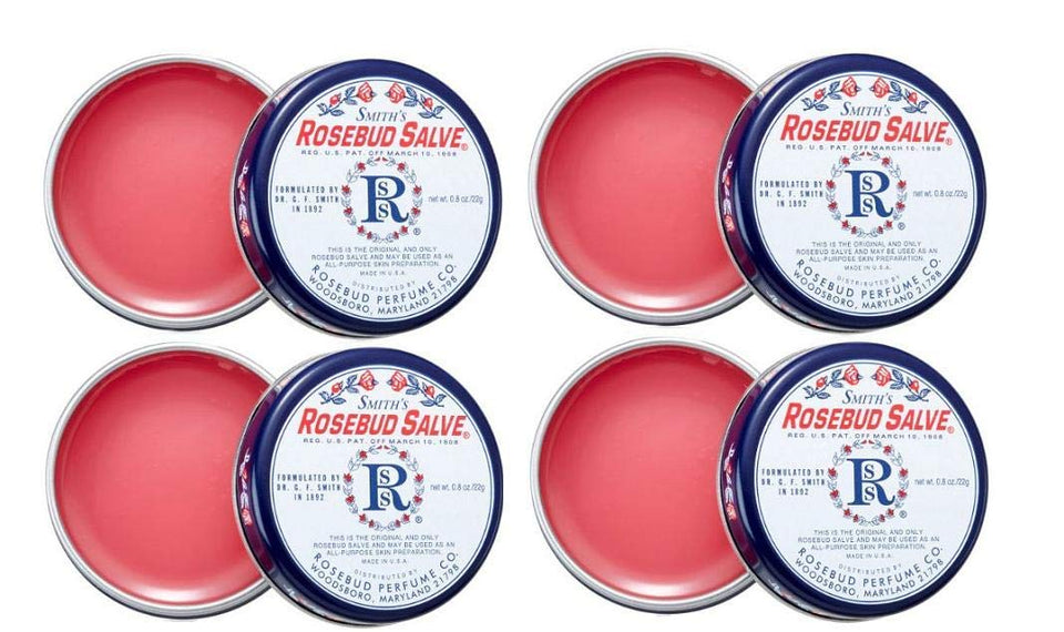 Rosebud Perfume front tin showing packaging and compact design for travel