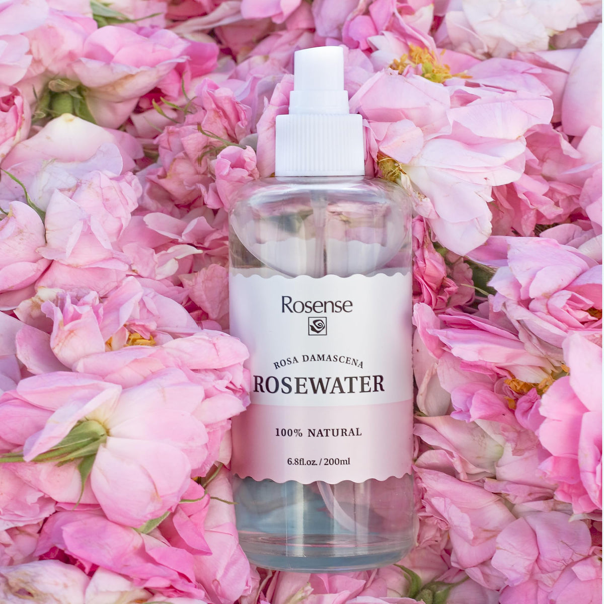 Rosense bottle next to bathtub suggesting relaxing bath use and sensory benefit