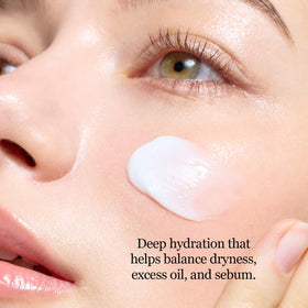 ROUND LAB cream being applied to hand demonstrating smooth, non-greasy finish