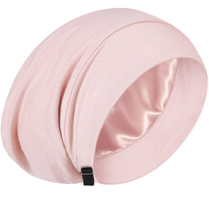 ROYBENS front view of black silk bonnet showing neat edge and fit benefit: protective coverage
