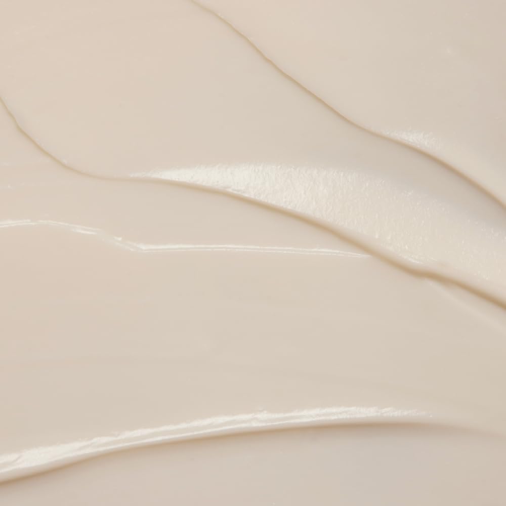 RŌZ applied to curly hair illustrating definition and frizz control