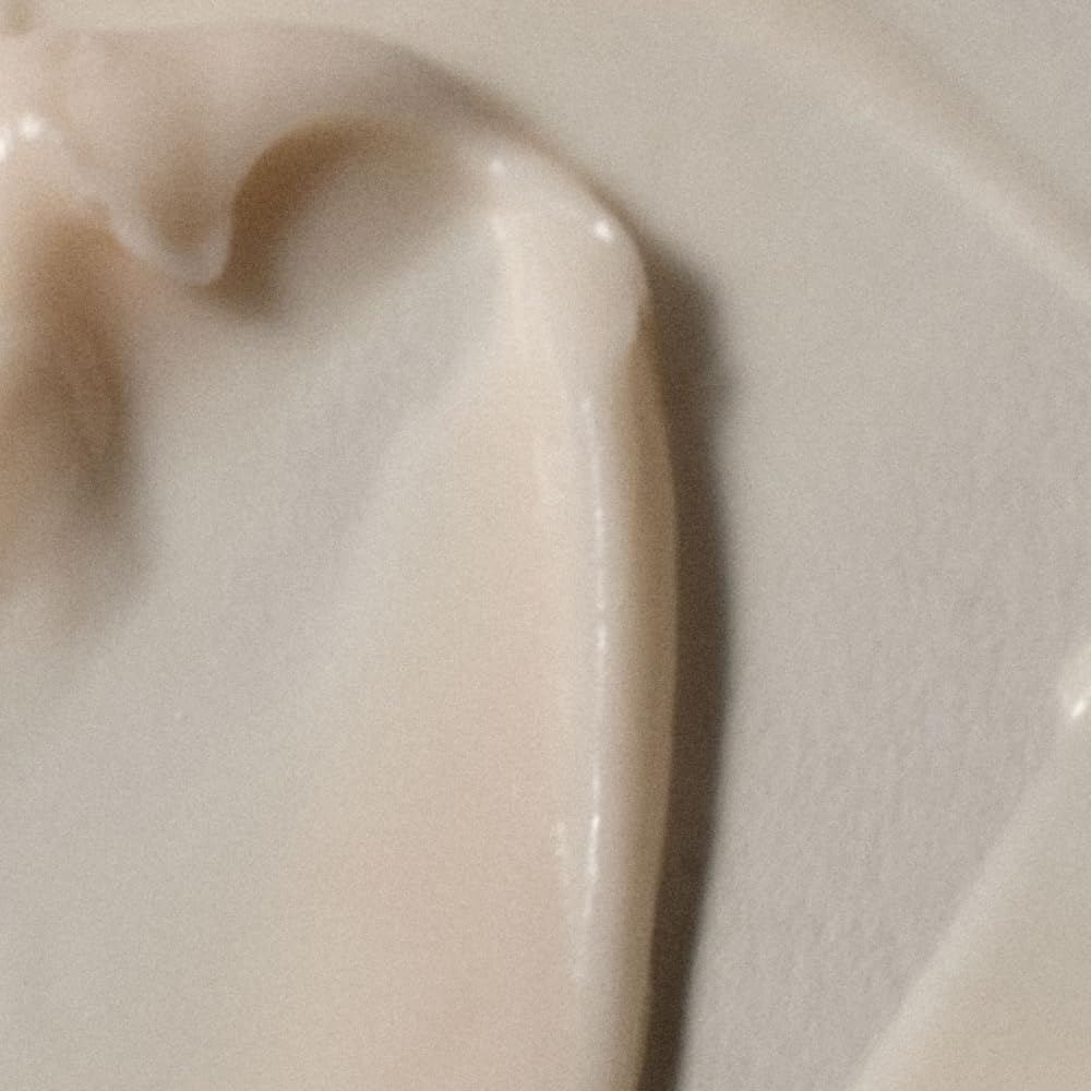 RŌZ creamy conditioner texture close-up demonstrating rich hydration